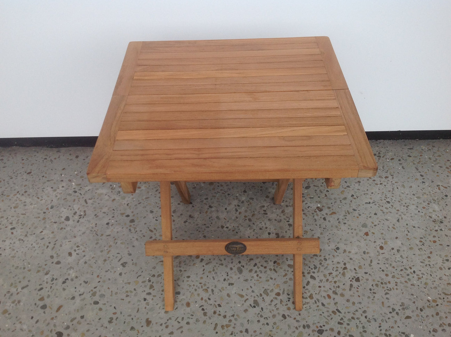 Neat folding small side table can fold completely flat for portablity. ORIGAMI PICNIC TABLE